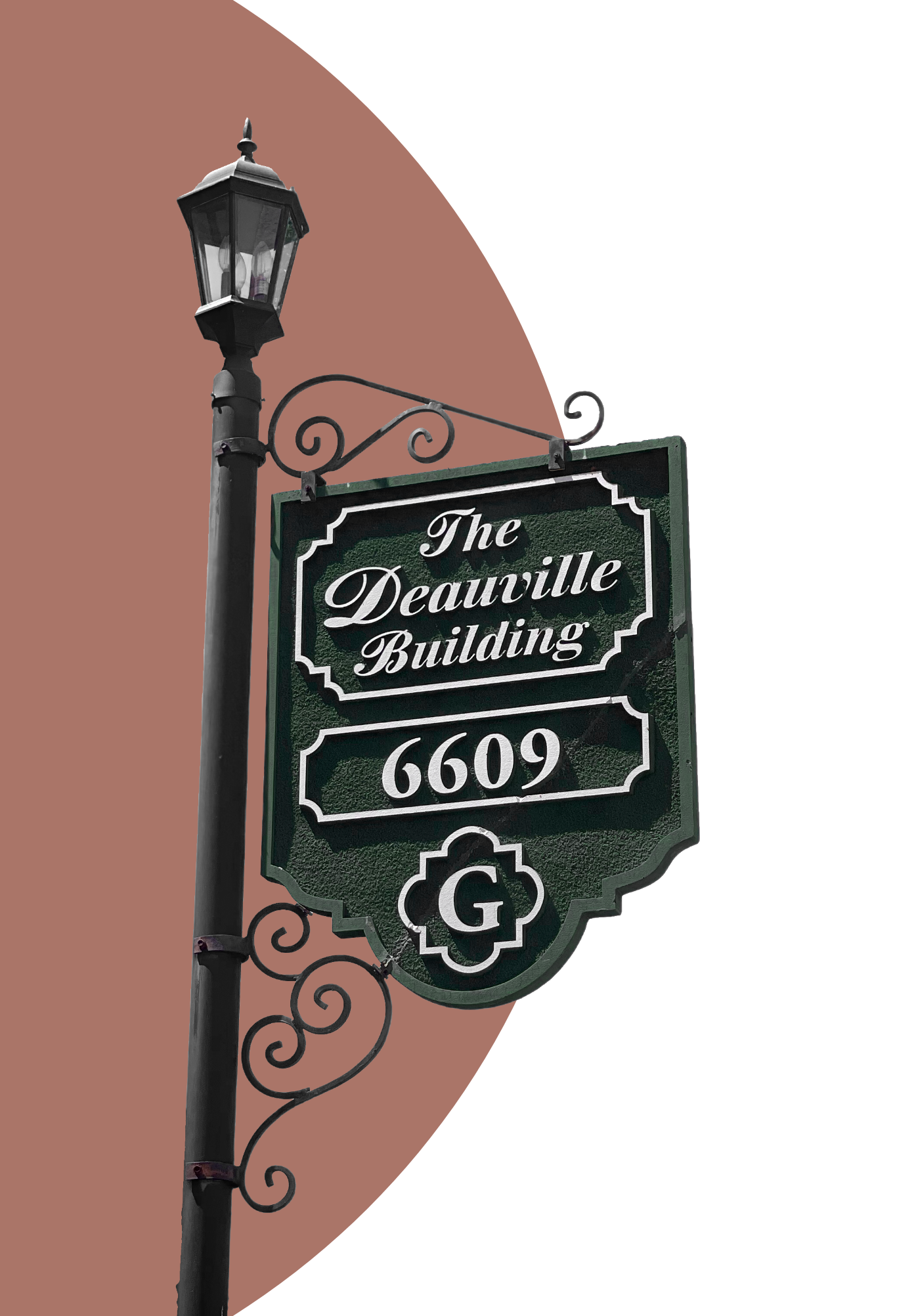 The Deauville Building sign at 6609